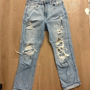 Women's Distressed Blue Jeans